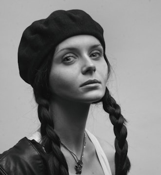 Black and white portrait of Juan Baraza embodying a complex character.