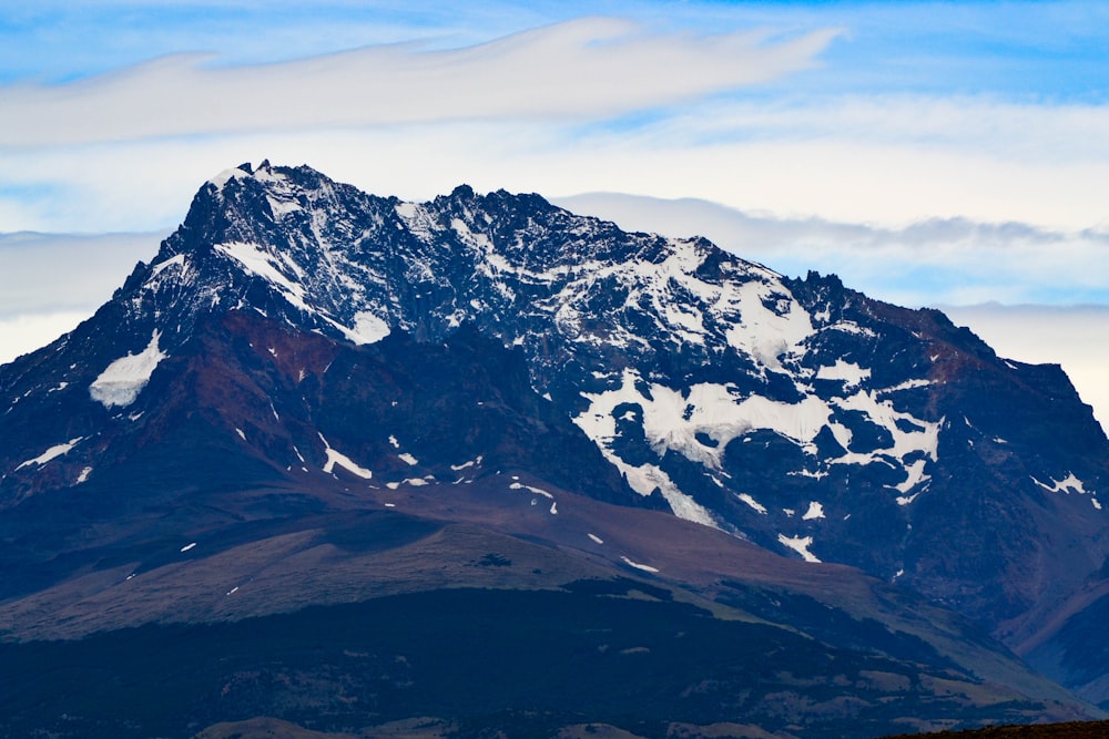 snow covered mountain during daytime