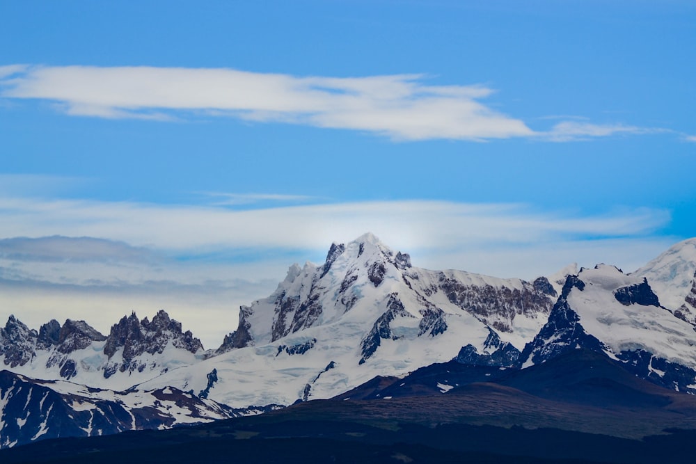 snow covered mountain under blue sky during daytime