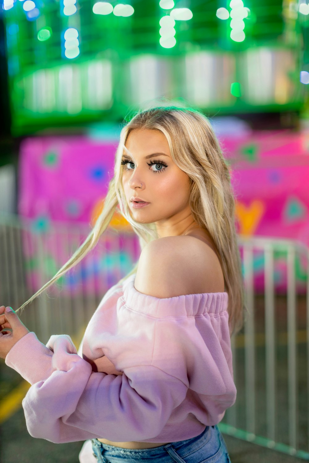 woman in pink off shoulder shirt