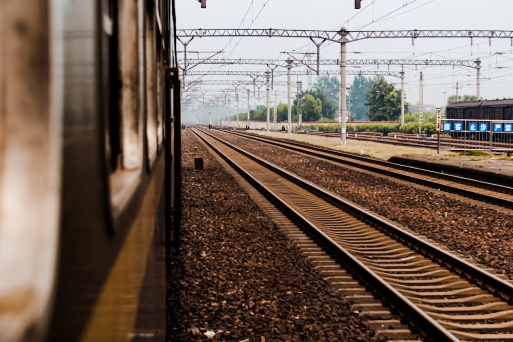 train rail tracks during daytime