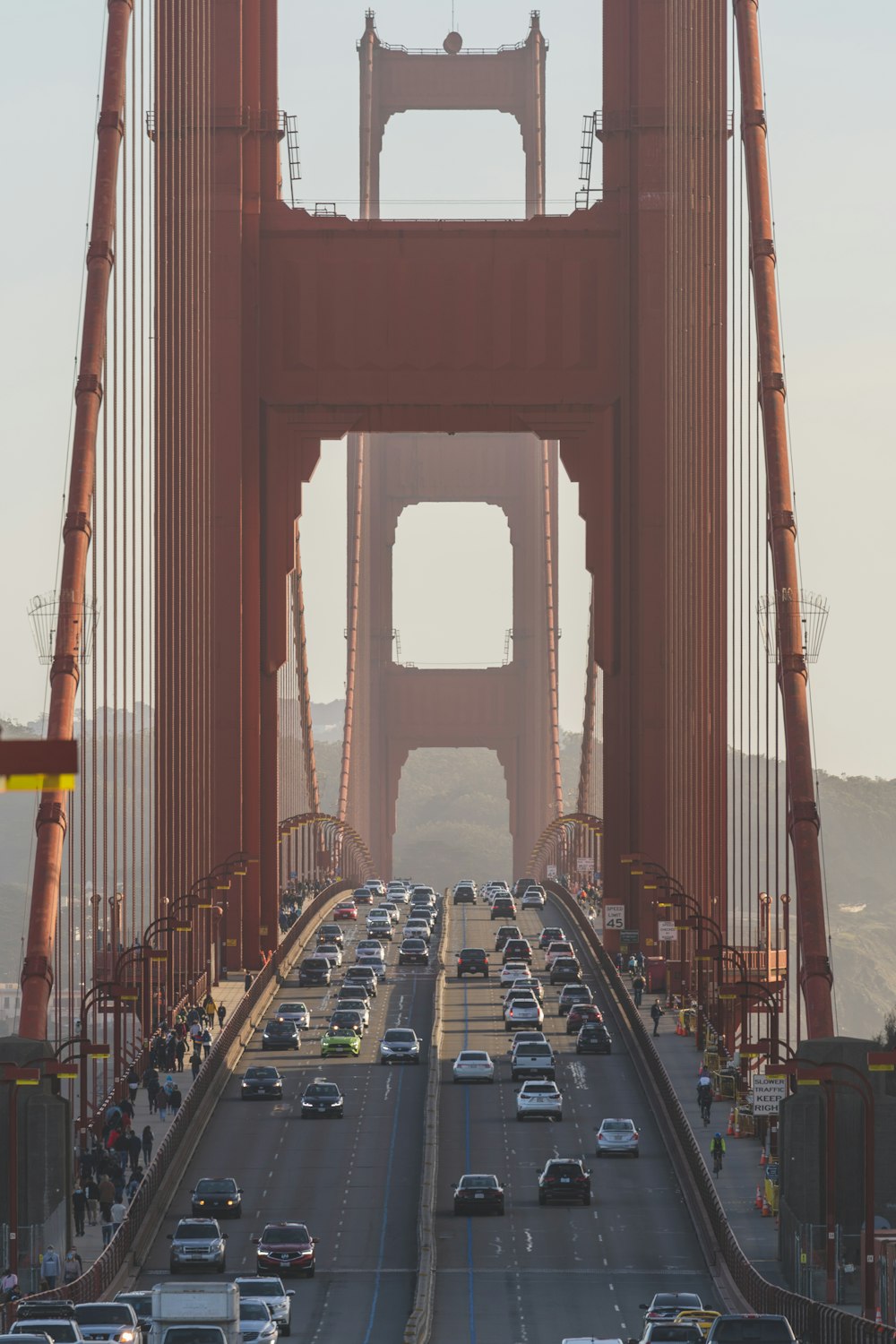 people walking on bridge during daytime