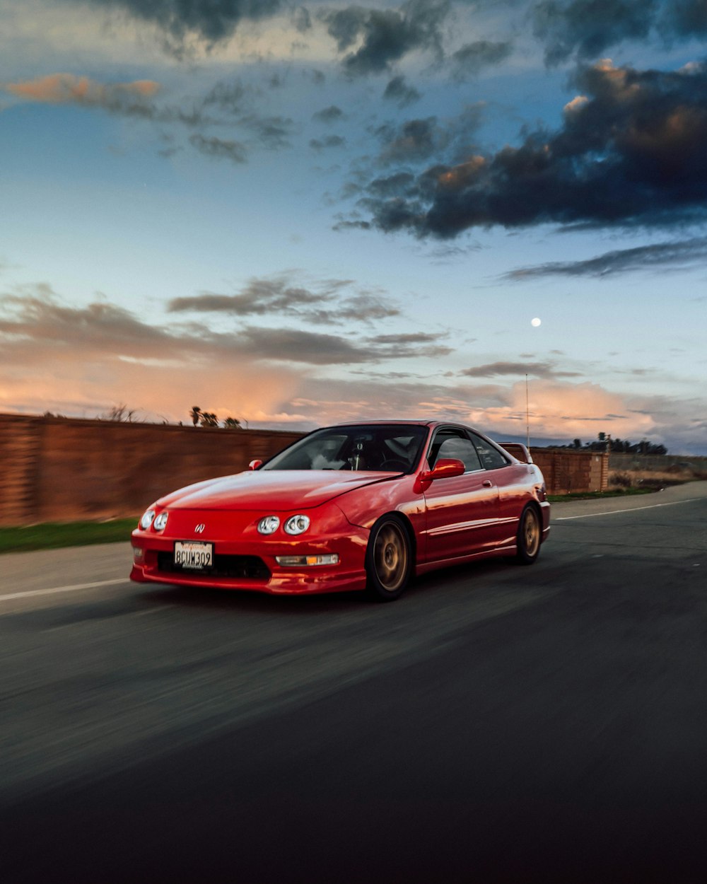 red audi a 4 on a road