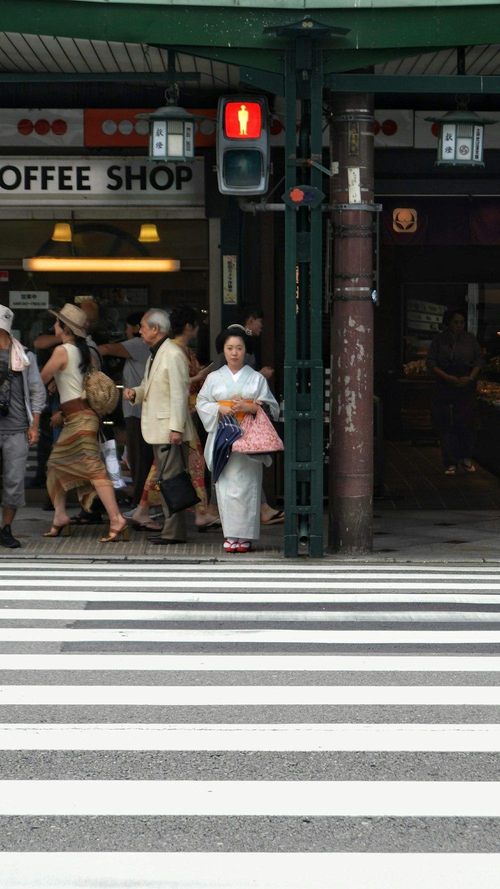 people walking on sidewalk during daytime