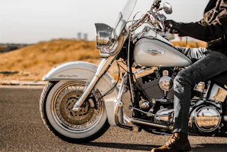 black and silver bajaj avenger motorcycle