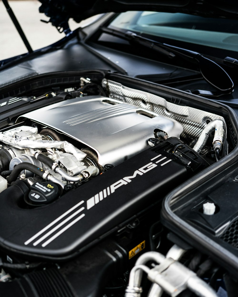 black and silver car engine bay