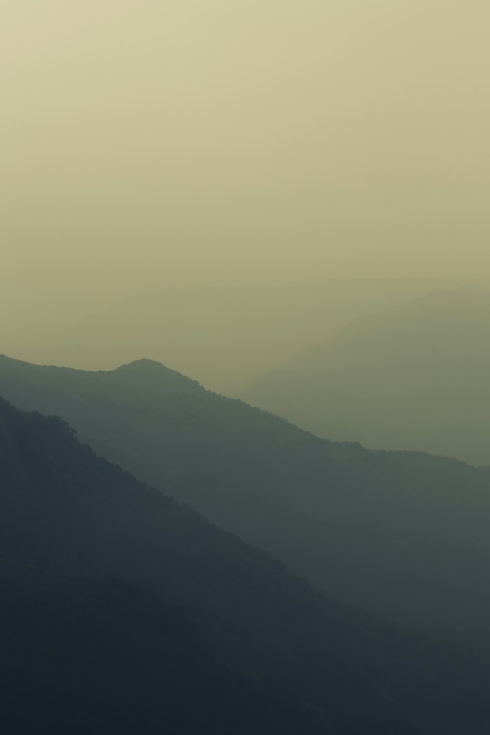 green mountains under white sky during daytime