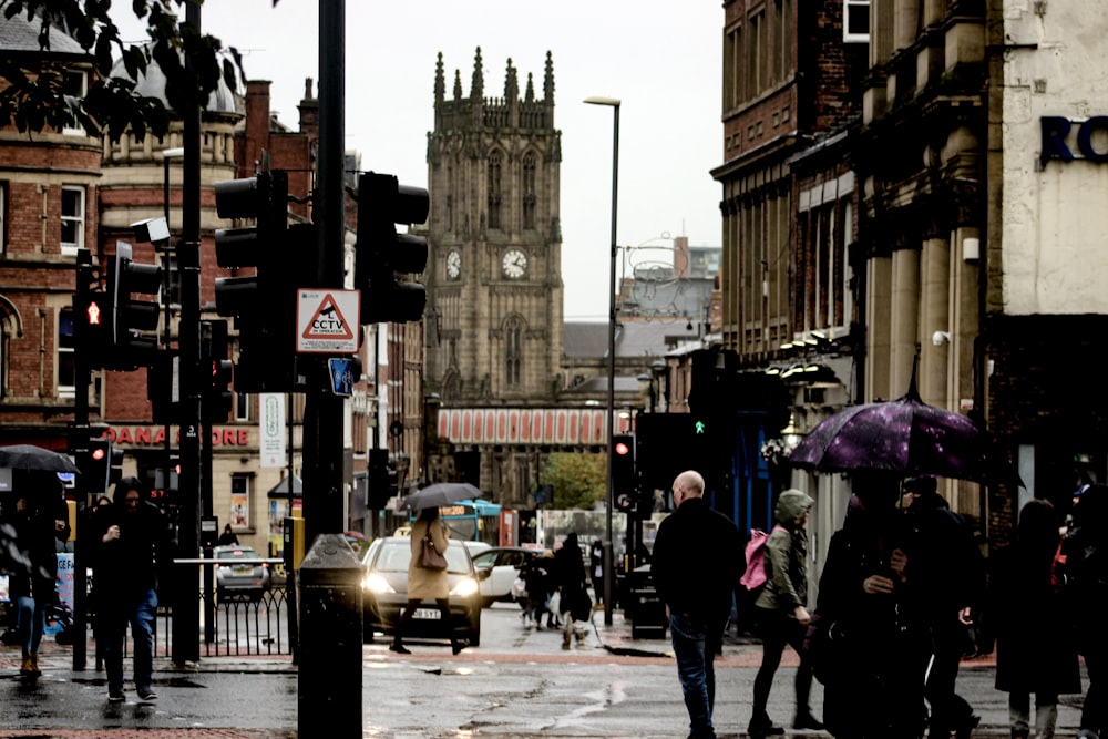 people walking on pedestrian lane during daytime