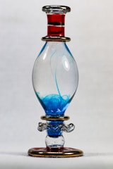 blue and red glass bottle