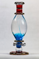 blue and red glass bottle