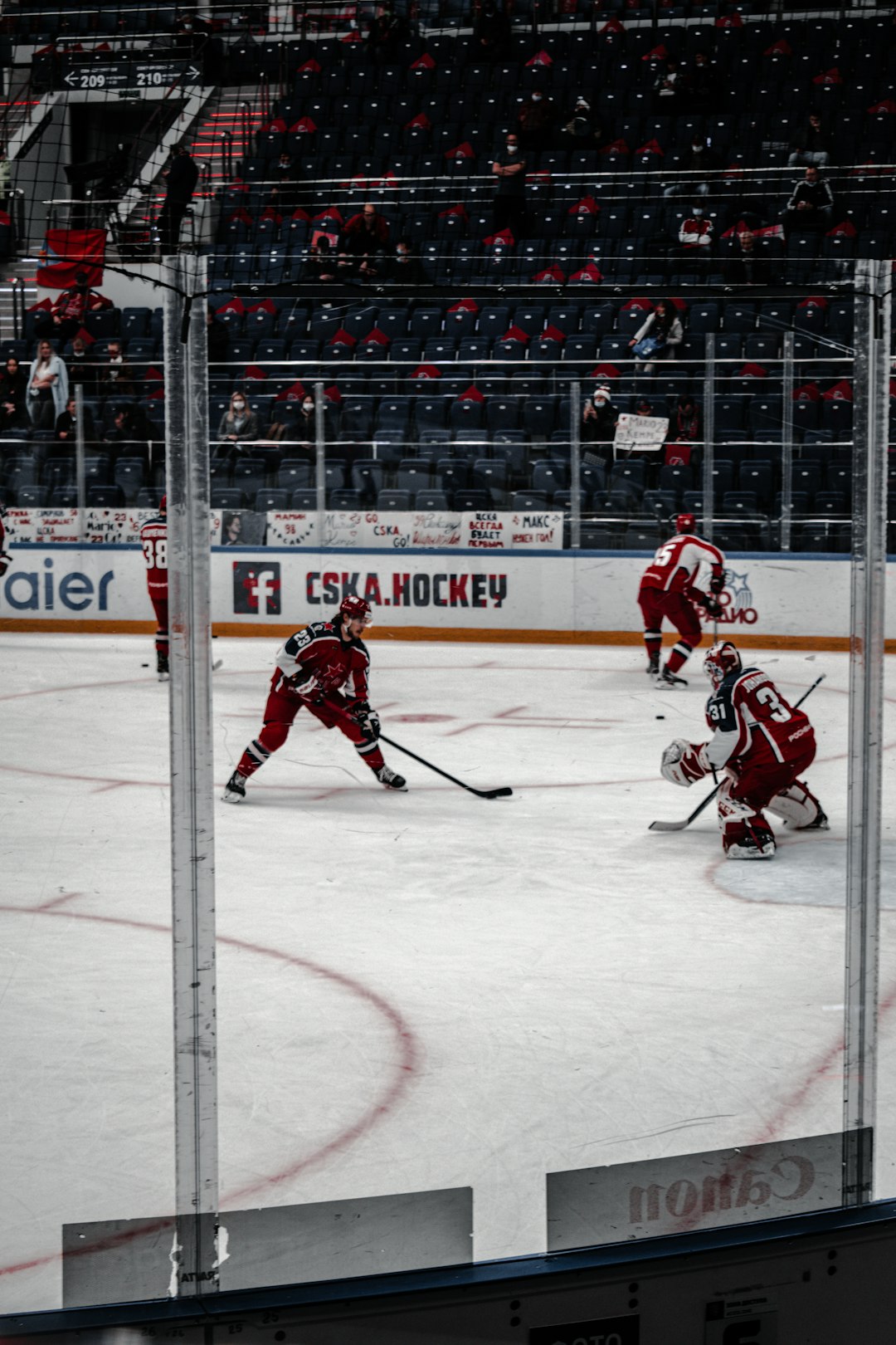 ice hockey players on ice hockey field