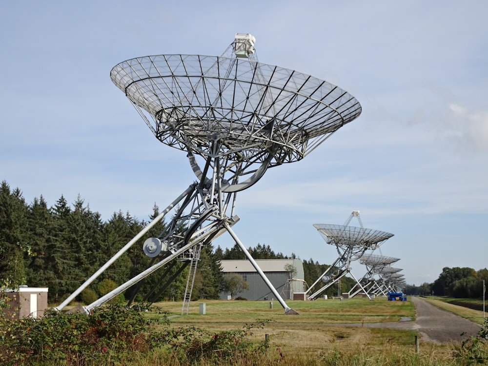 white satellite dish under cloudy sky during daytime