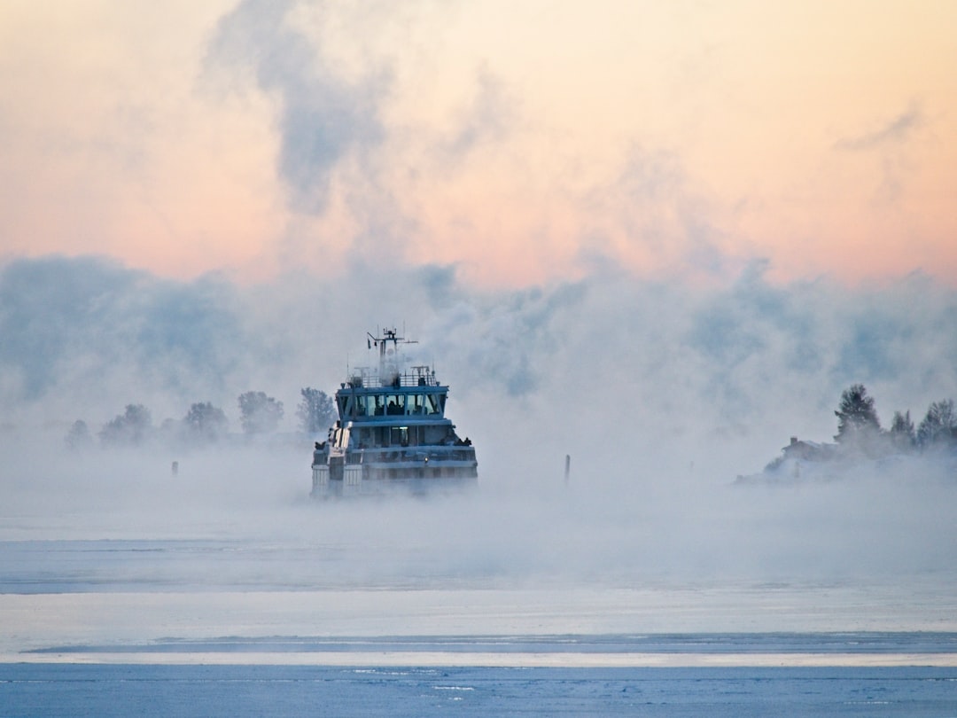 white and black ship on sea during daytime