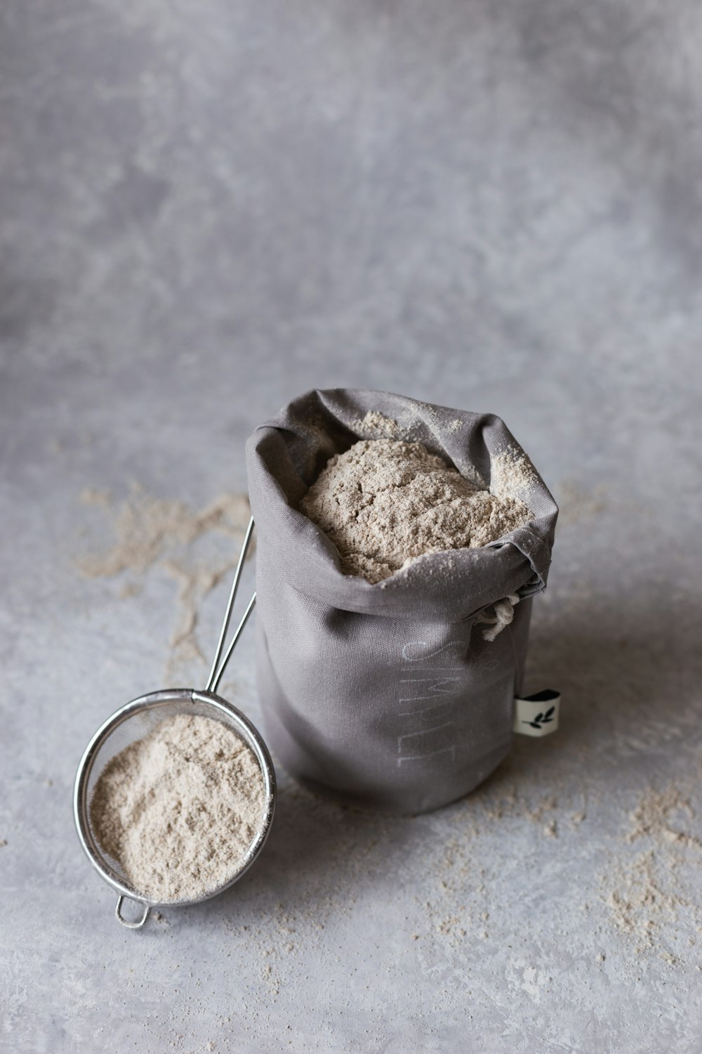 stainless steel cup with brown powder