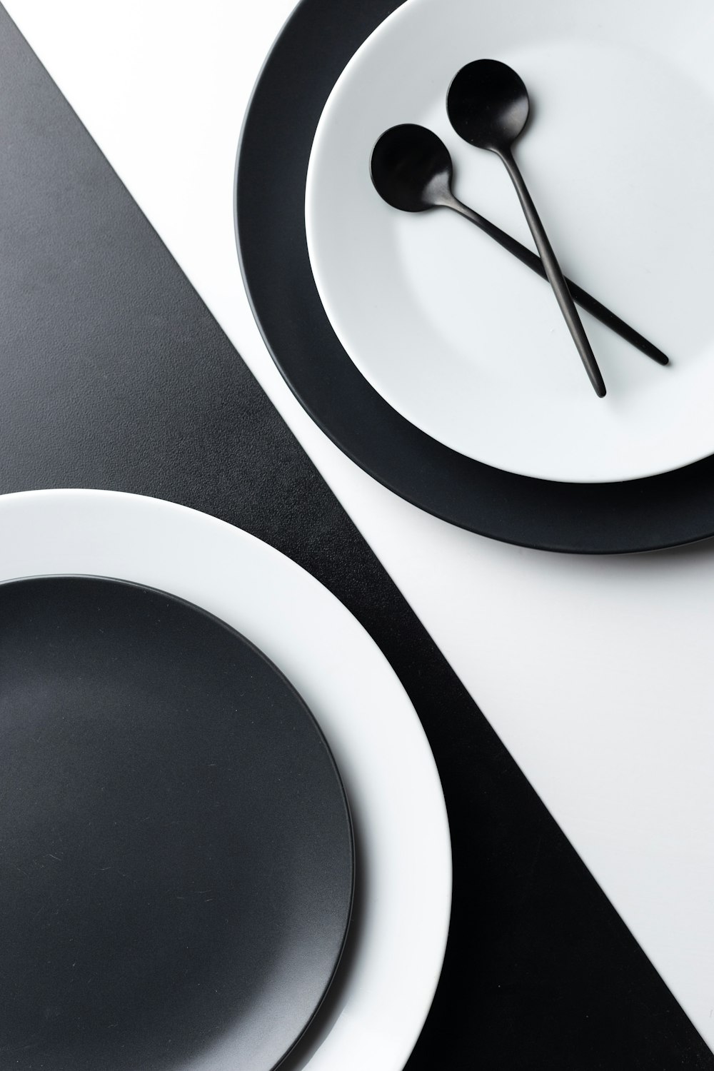 stainless steel fork on white ceramic plate