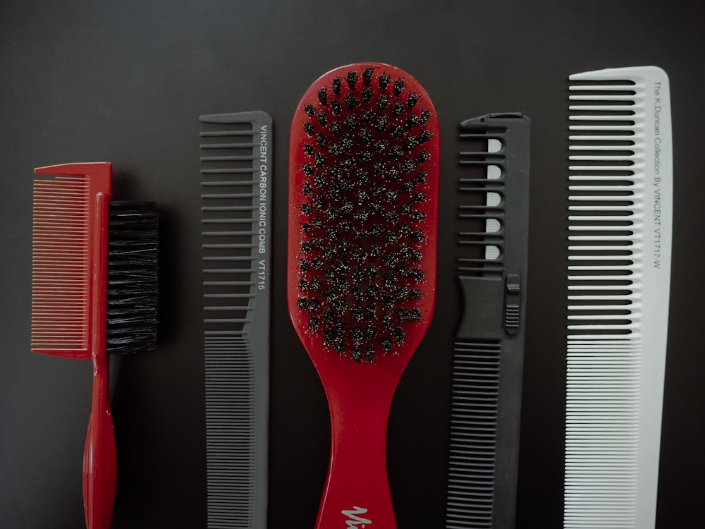 red and black hair brush