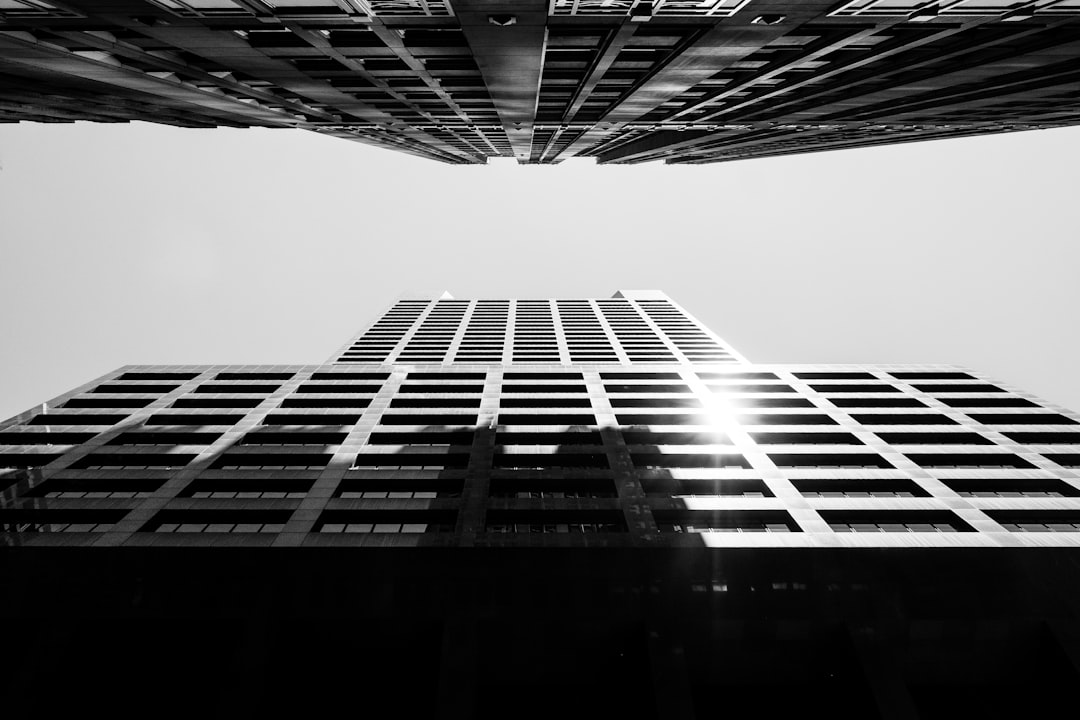 grayscale photo of high rise building