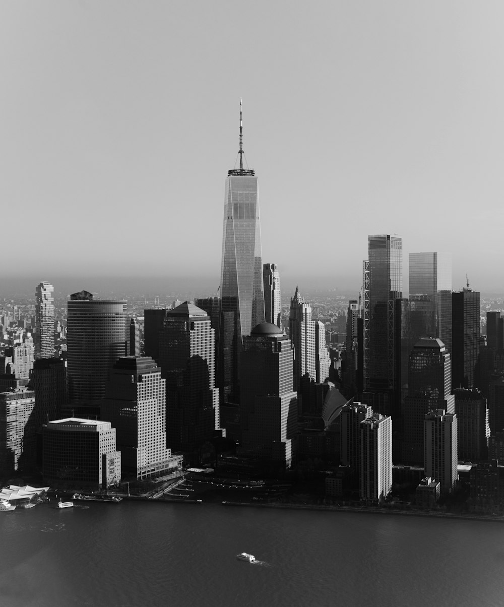 grayscale photo of city buildings