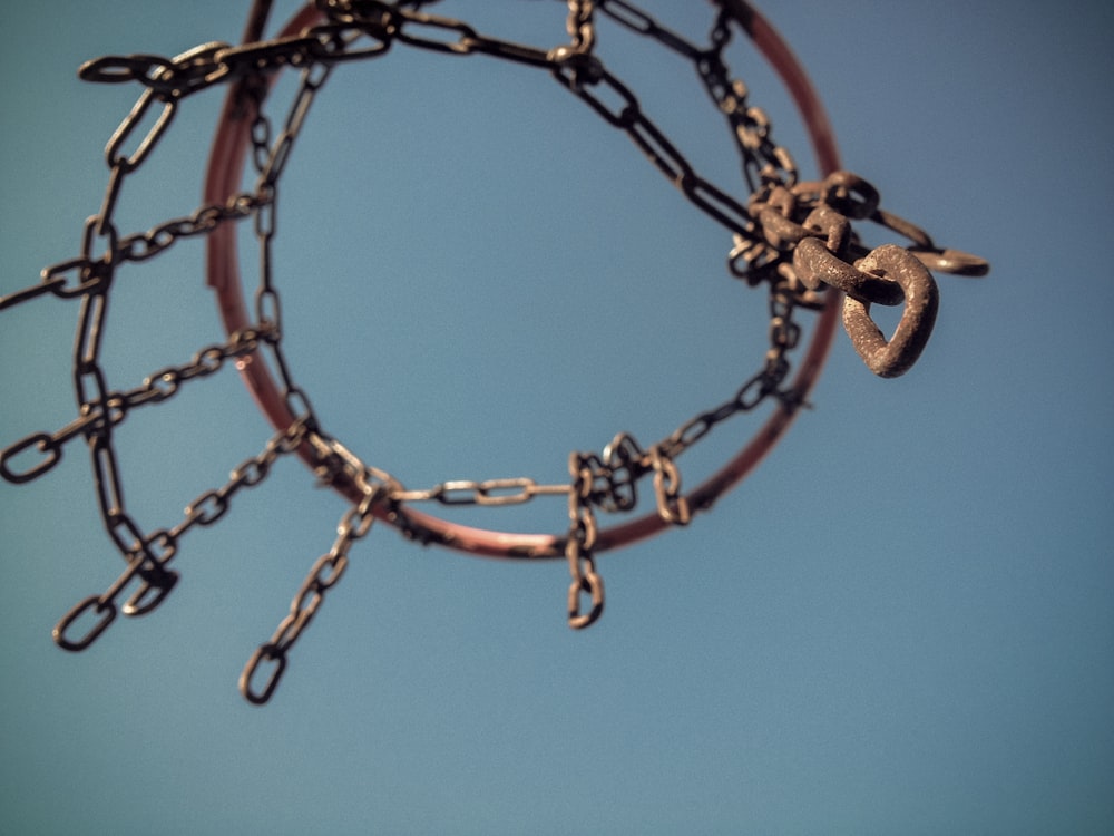 brown metal chain on blue background