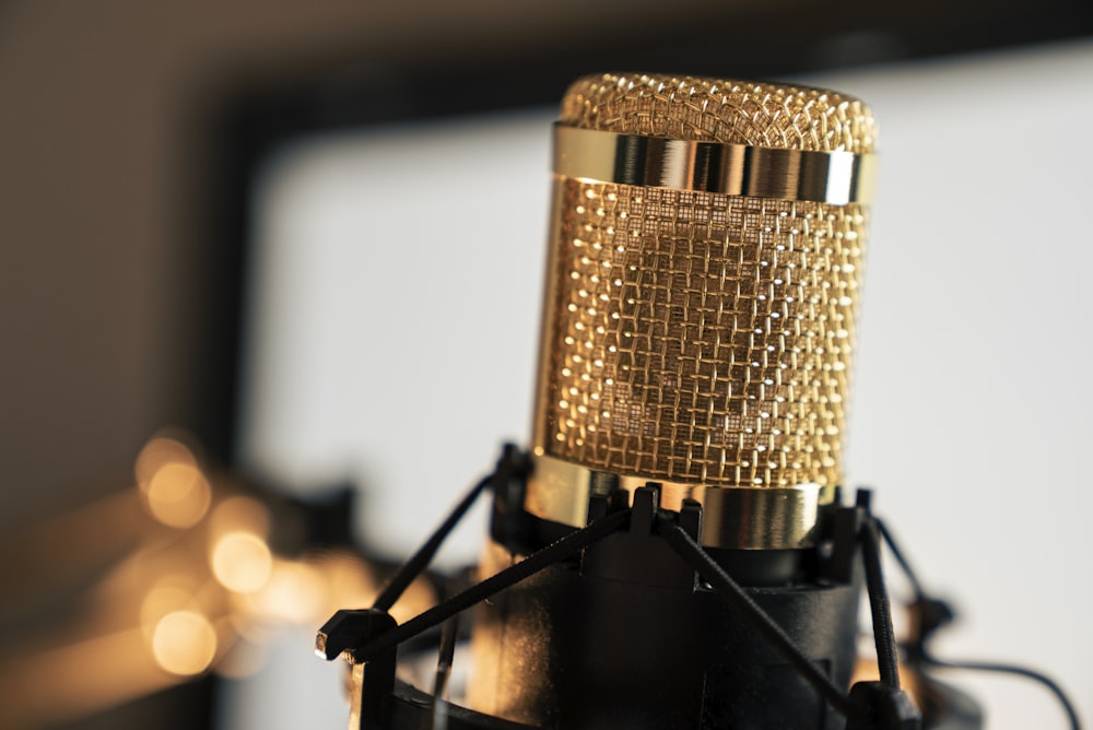 Gold condenser microphone on black stand photo – Free Microphone Image on  Unsplash