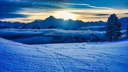 snow covered mountain under cloudy sky during daytime in Mayrhofen Austria