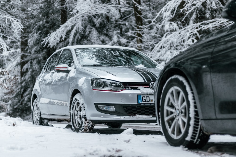 gray bmw m 3 on snow covered ground