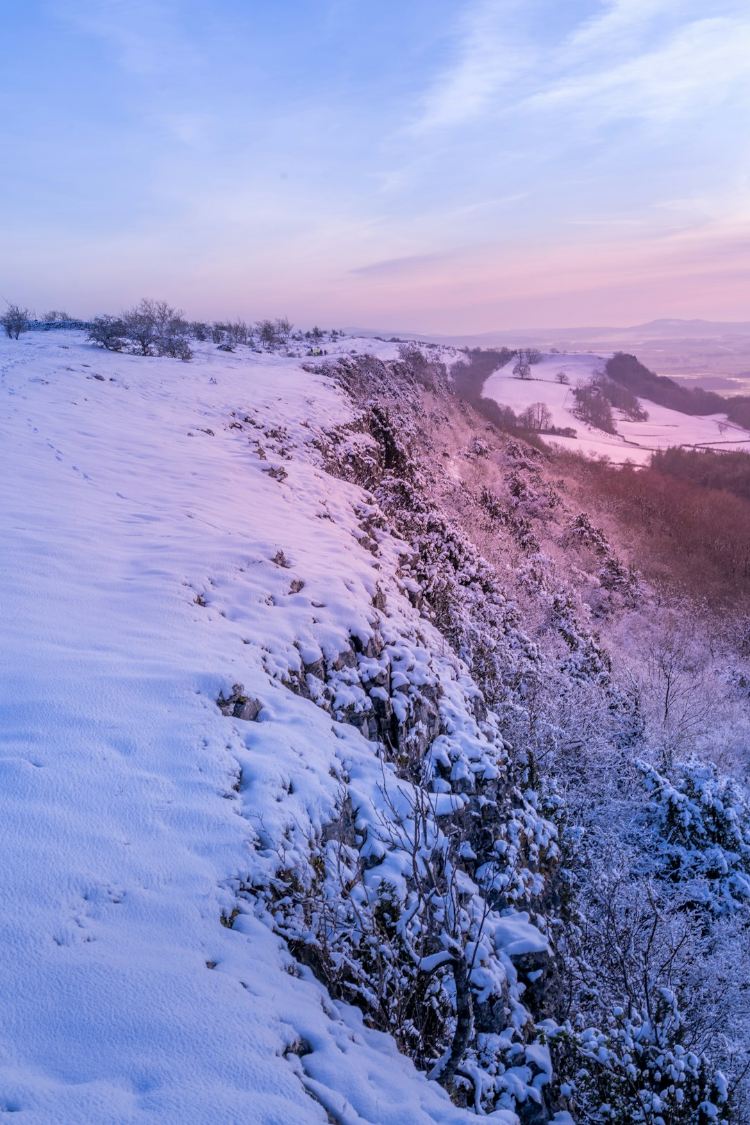 snow covered mountain during daytime