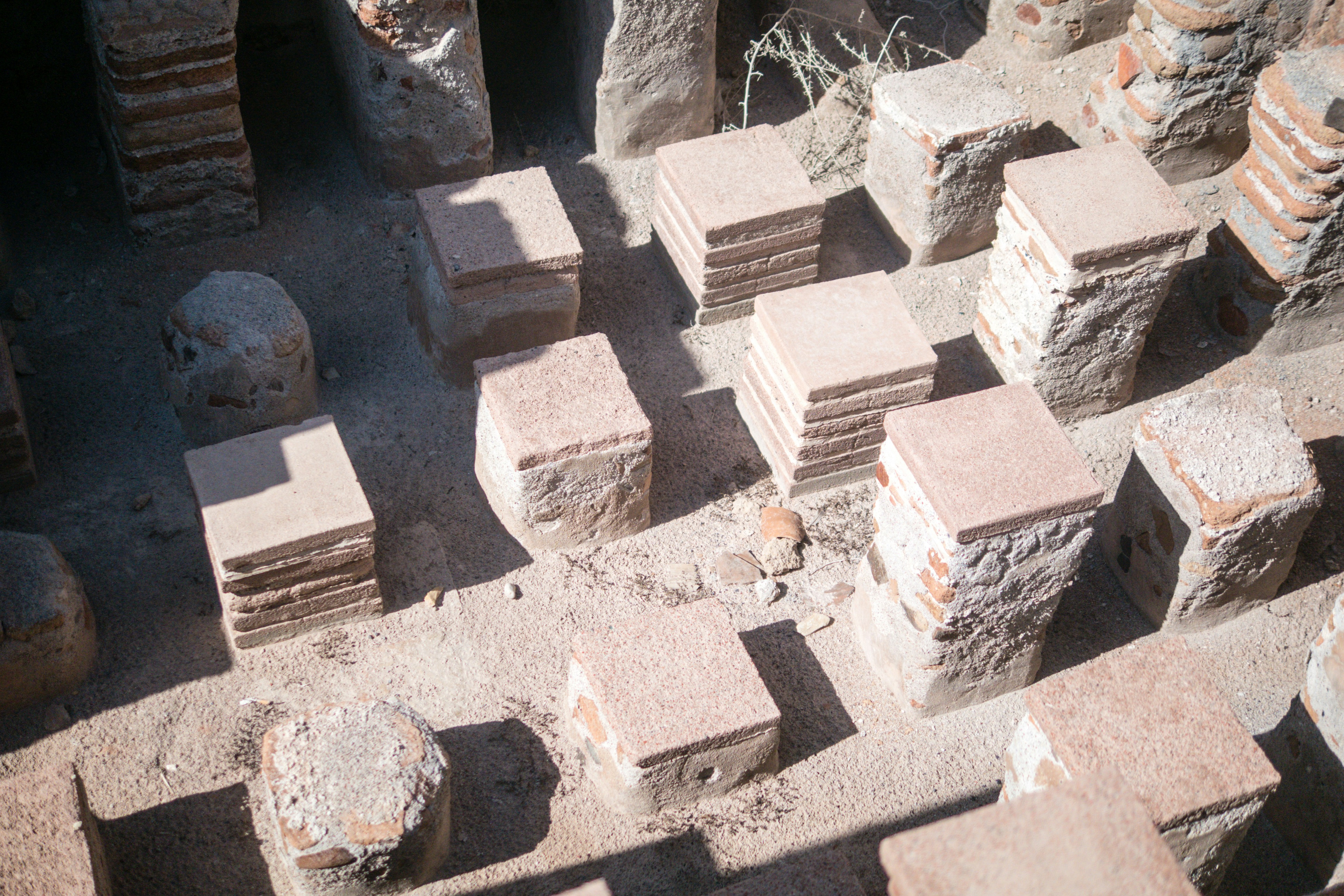 raw sandstone blocks sorted by size for dry stack wall construction