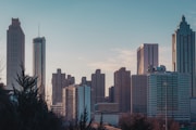 city skyline under blue sky during daytime