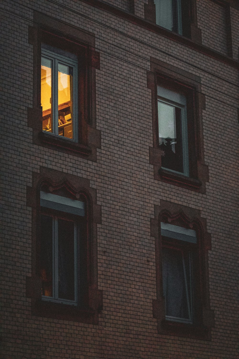 brown wooden framed glass window