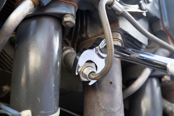 Protective sleeve fitted over industrial hose and pipe