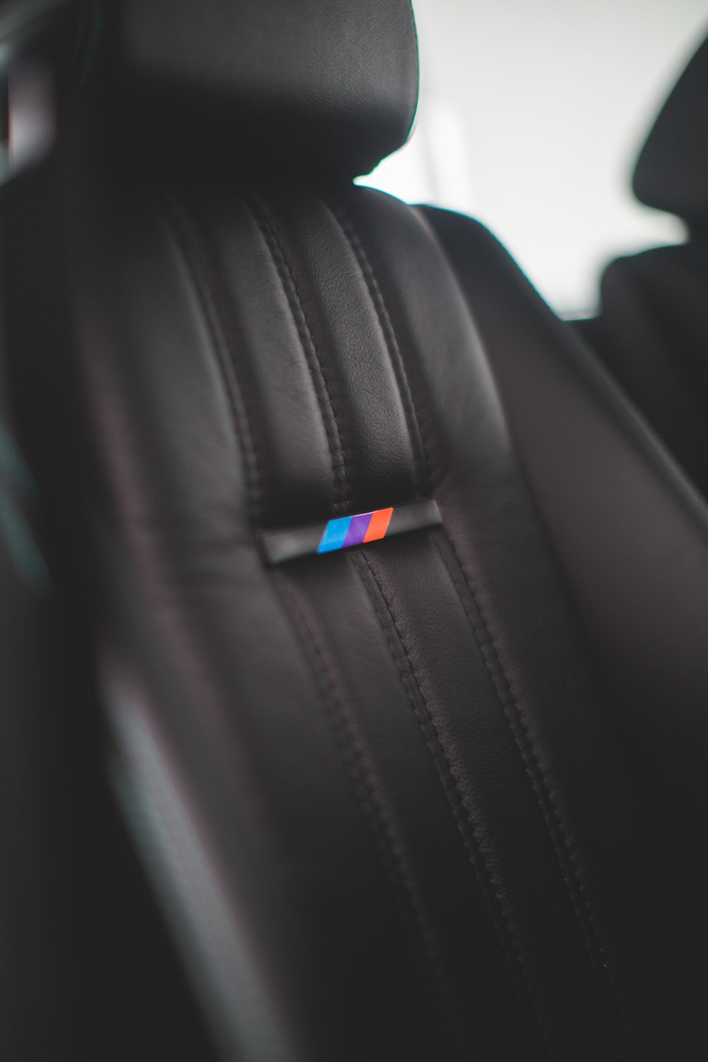 black leather car seat during daytime