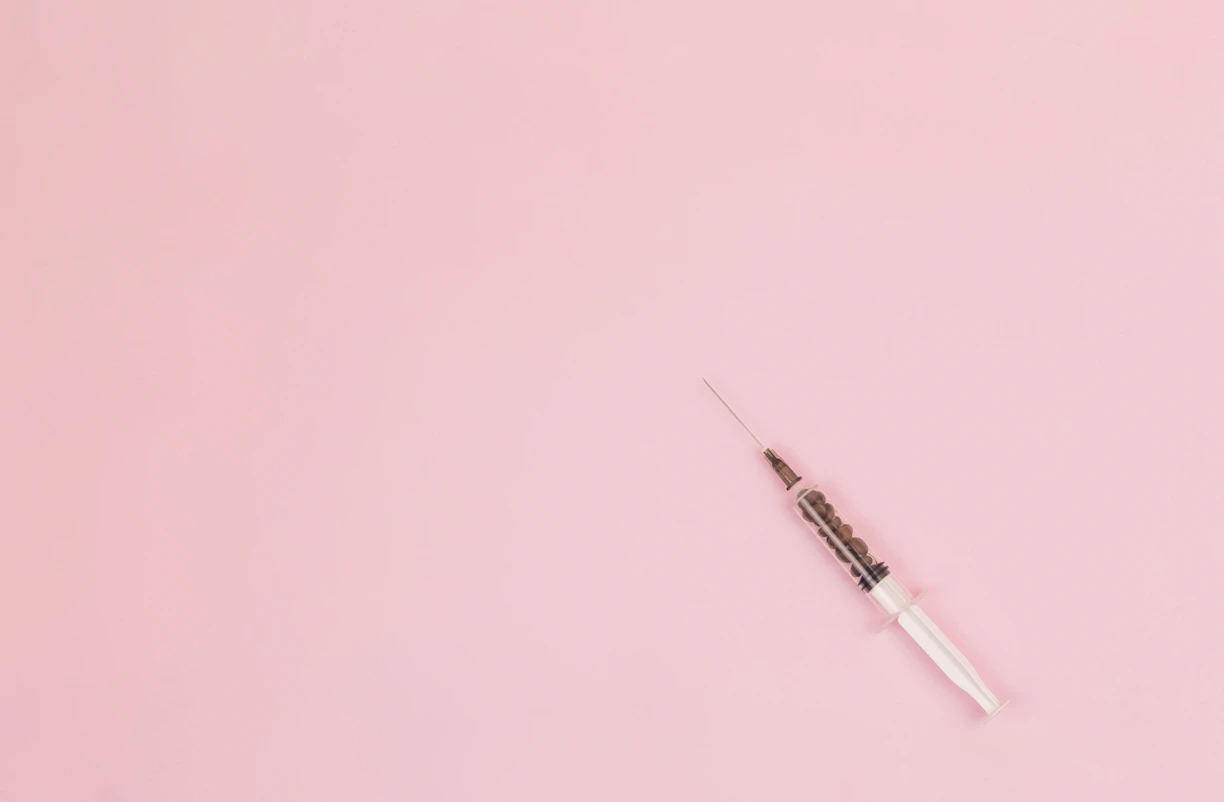 black pen on pink surface