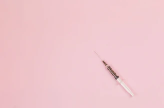 black pen on pink surface