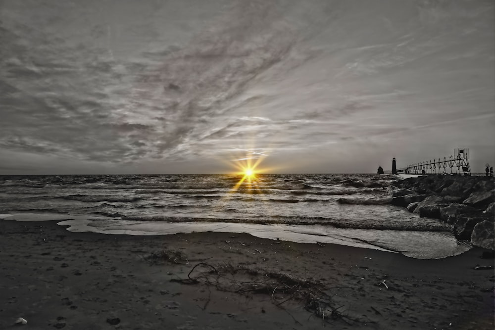 people on beach during sunset