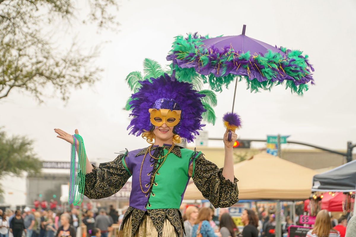 New Orleans February — Mardi Gras beads and masks on Bourbon Street