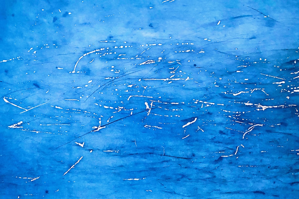 white and blue abstract painting