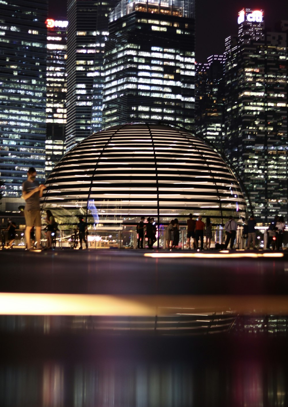 people walking on the street during night time