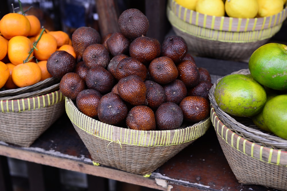 brown round fruit on brown woven basket