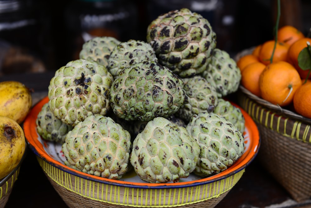 green and brown round fruit