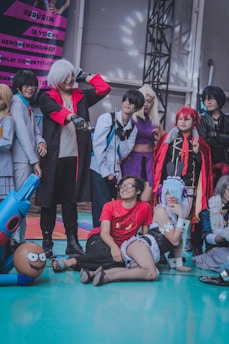 A vibrant collage of various NSFW cosplay characters in dynamic poses.