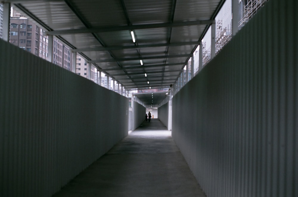 black and white hallway with lights