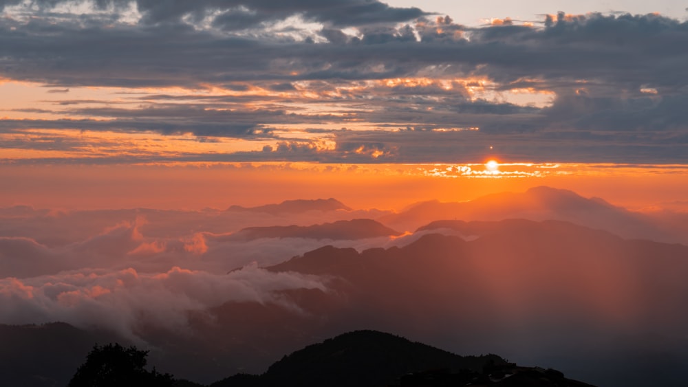 silhouette of mountain during sunset