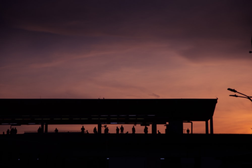 silhouette of building during sunset