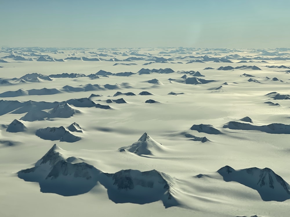 snow covered mountain during daytime