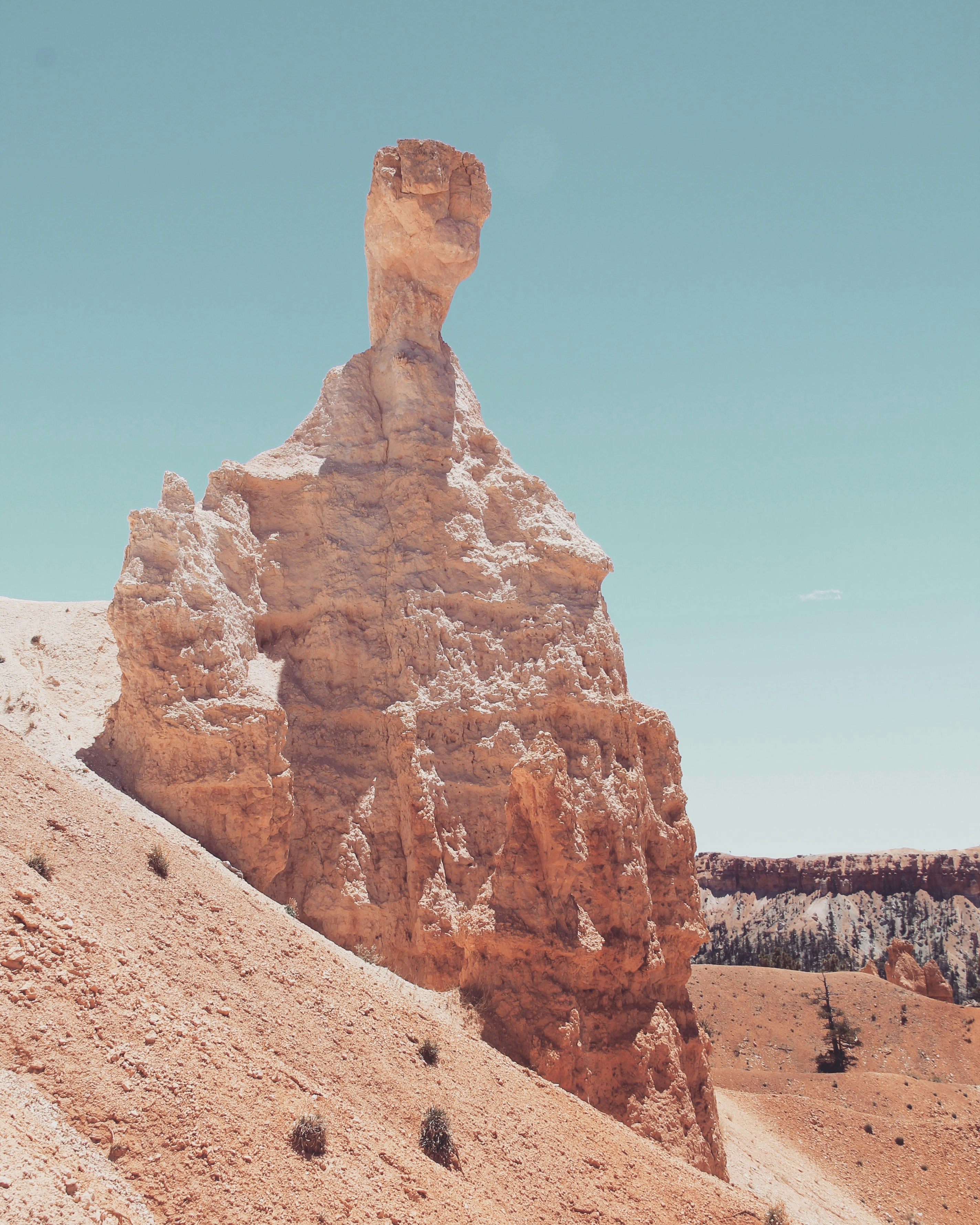 brown rock formation under blue sky during daytime