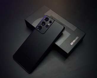black sony remote control on black table