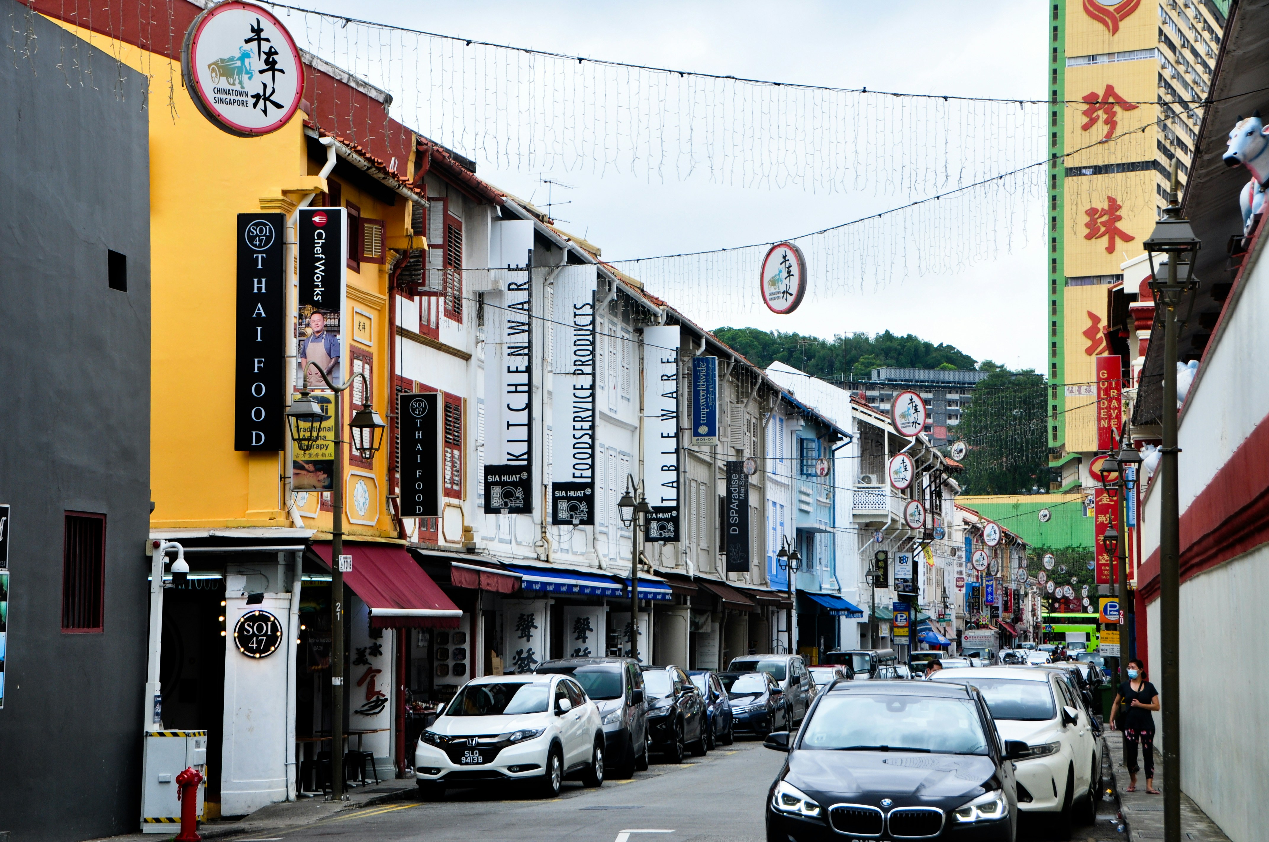 cars parked on street near buildings during daytime