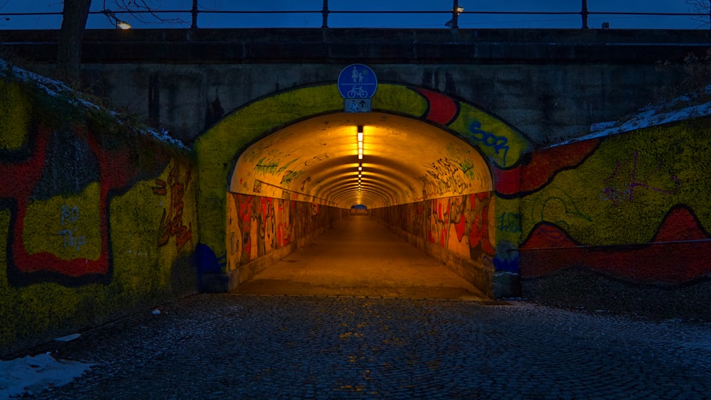 brown and gray brick tunnel