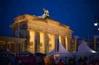 The Liberty Bell illuminated against a twilight sky, symbolizing freedom and renewal during the convention week.